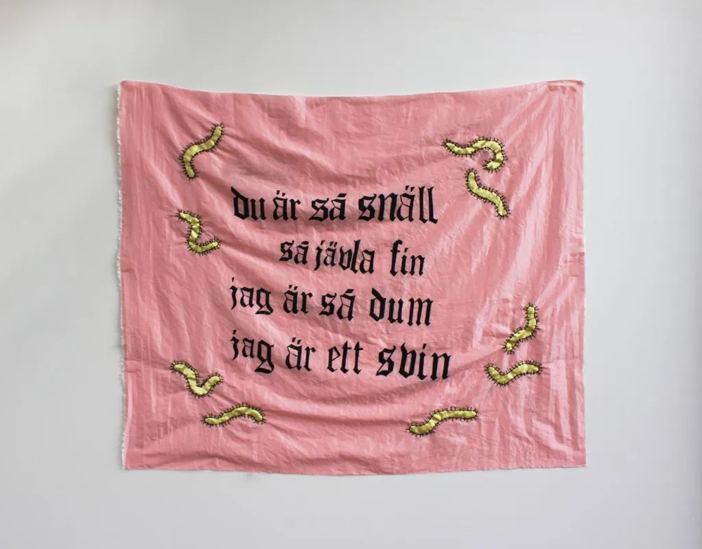 screentryckt och broderat tyg